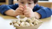 Child Eating Peanuts