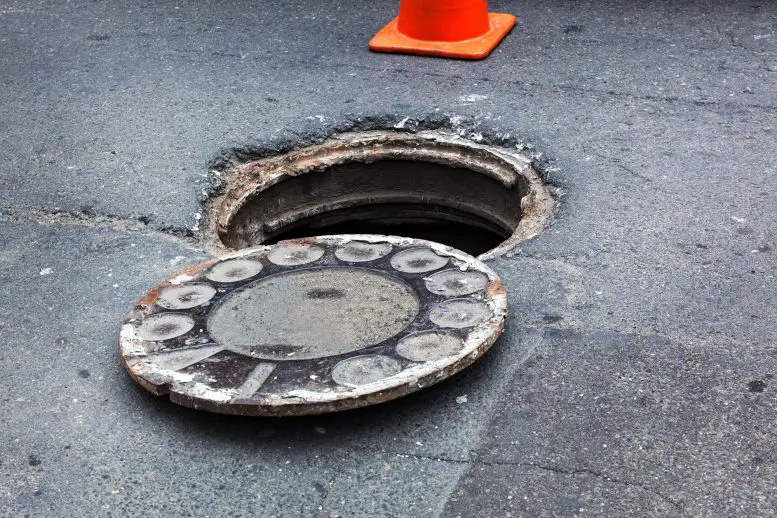 Open Manhole on Road