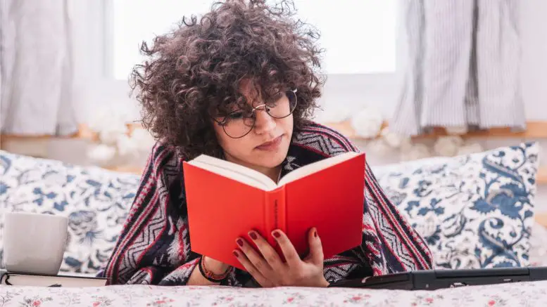 Teenage Girl Reading Book