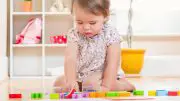 Toddler Girl Playing Inside