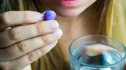 Woman Taking Antidepressant Pill